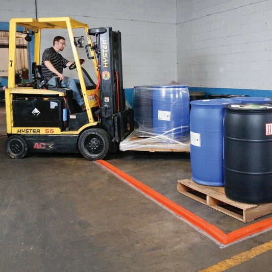 New Pig Build-A-Berm drive over barrier installed for spill control