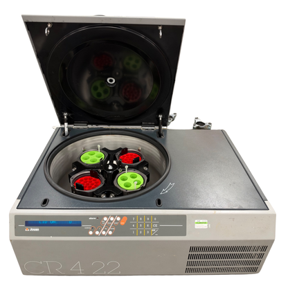 Front view of a Jouan CR4-22 refrigerated centrifuge with an open lid, showing the internal stainless steel chamber, 4-position swinging bucket rotor, and digital control panel.