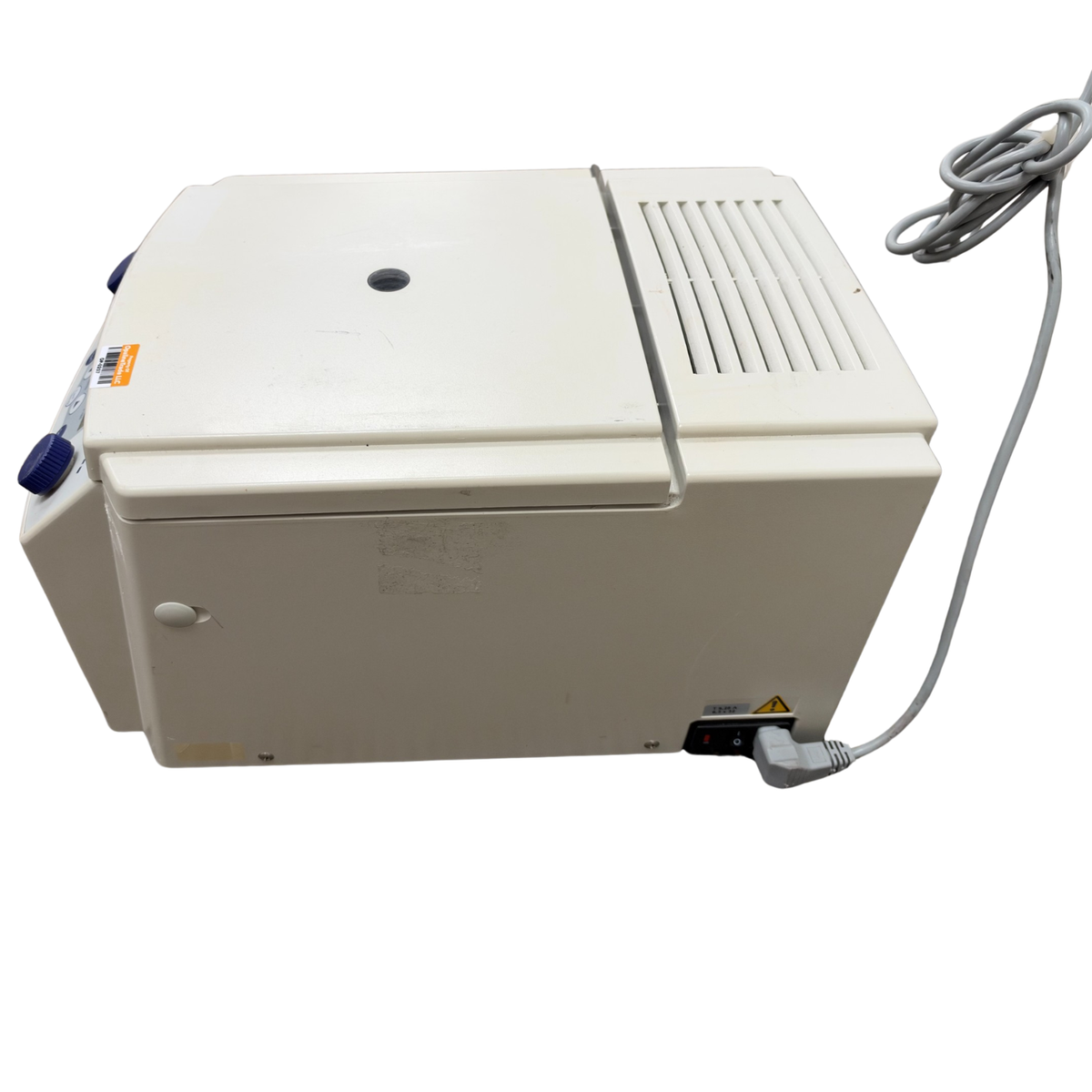 Back and side view of the Eppendorf 5415 R centrifuge highlighting the power switch, attached power cord, and ventilation grilles.