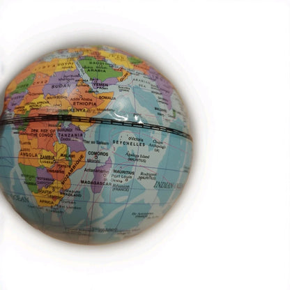 Small desktop world globe with colorful detailed world map
