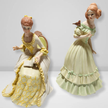 Vintage Victorian lady porcelain figurines pair reading lady and girl with bird