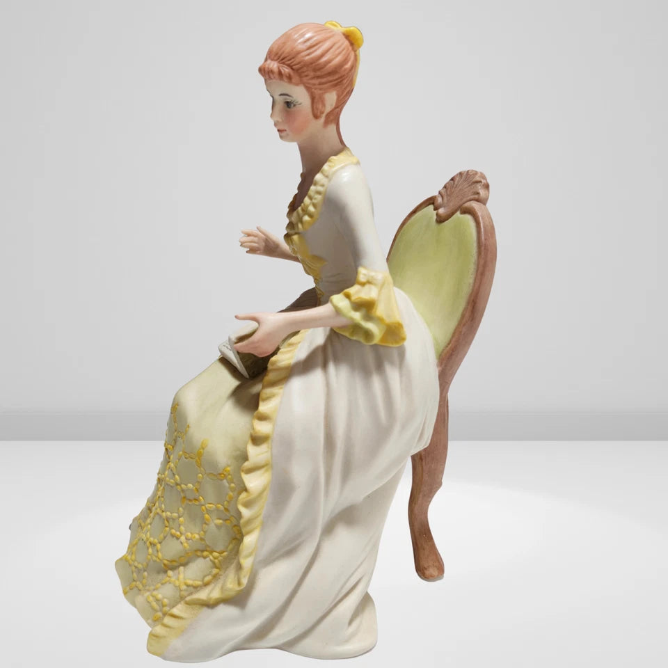 Victorian porcelain figurine of lady reading book vintage decor