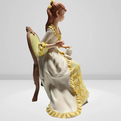 Victorian porcelain figurine of lady reading book vintage decor