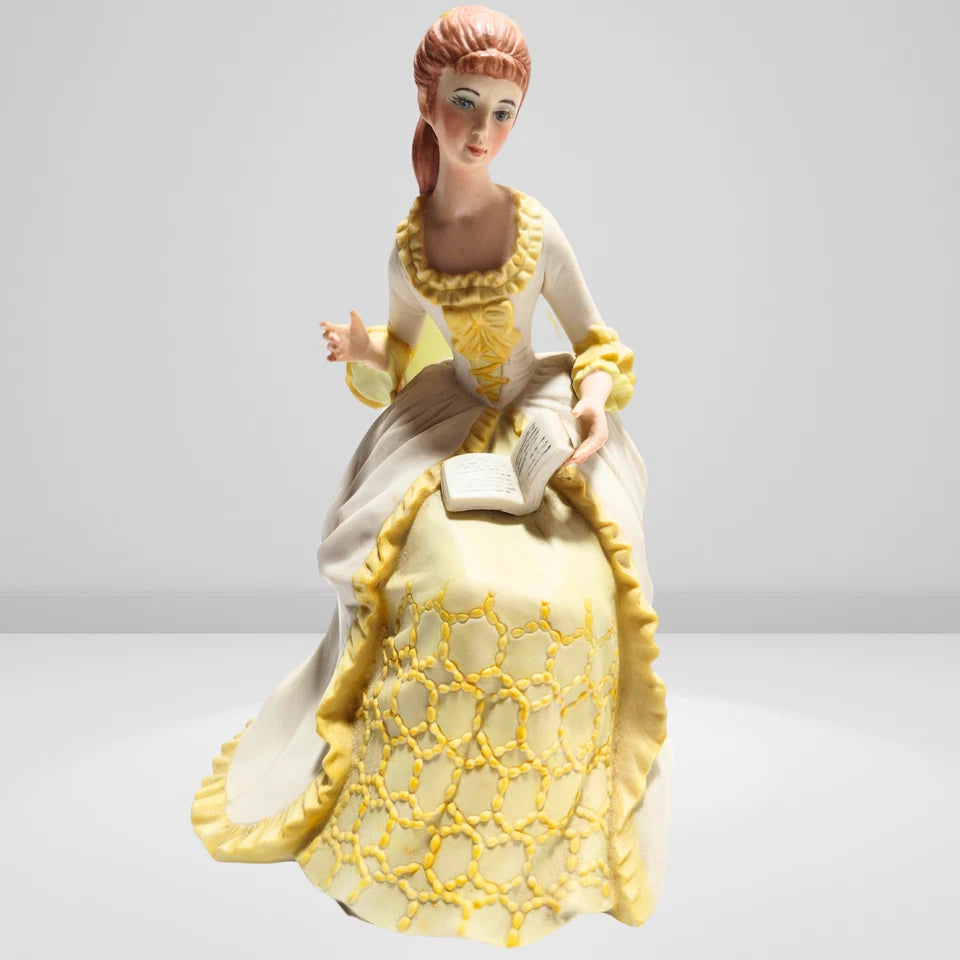Victorian porcelain figurine of lady reading book vintage decor
